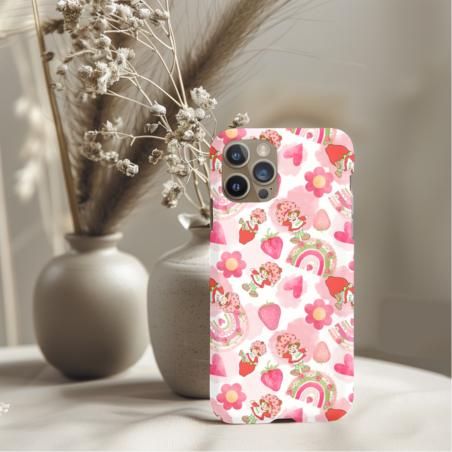 Pretty Strawberry Shortcake Phone Case with pink hearts, strawberries, flowers, and playful character design on white background