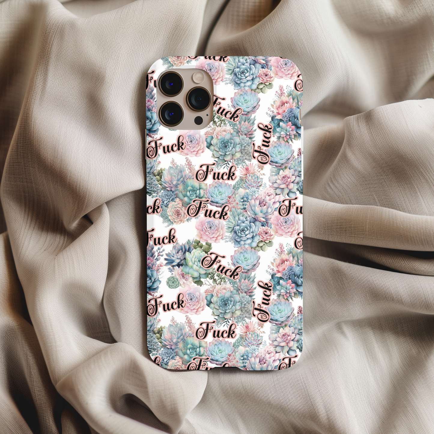 Floral Eff Phone Case with pastel succulents and flowers design on a phone placed on soft beige fabric background