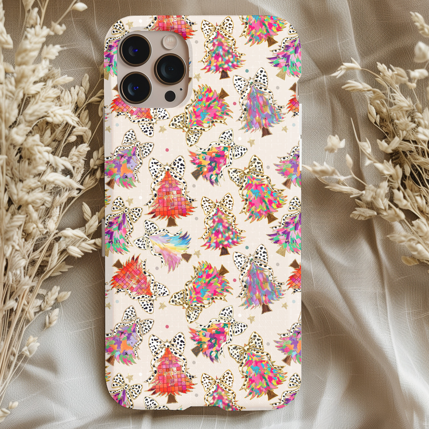 Colorful Christmas Trees Phone Case featuring vibrant artistic Christmas tree patterns with leopard print bows on a neutral background