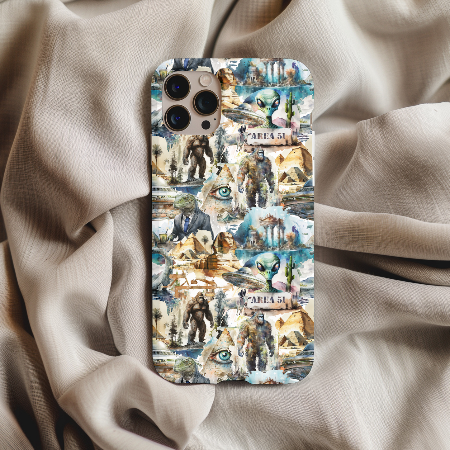 Conspiracy Theories Phone Case featuring aliens, Bigfoot, pyramids, and Area 51 artwork on a smartphone cover.