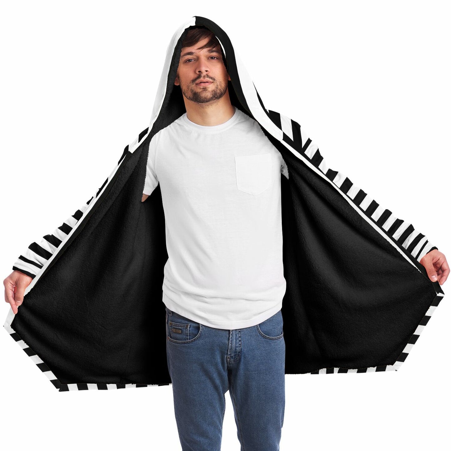Man wearing Black White Stripes Fleece Lined Hooded Cloak open showing soft interior lining and striped edges