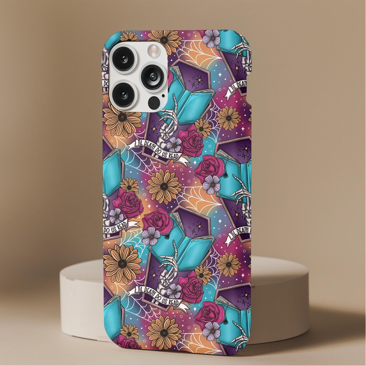 Deathly Reader Skeleton Bookish Phone Case with colorful skeleton hands, books, flowers, and spiderweb design on a purple background