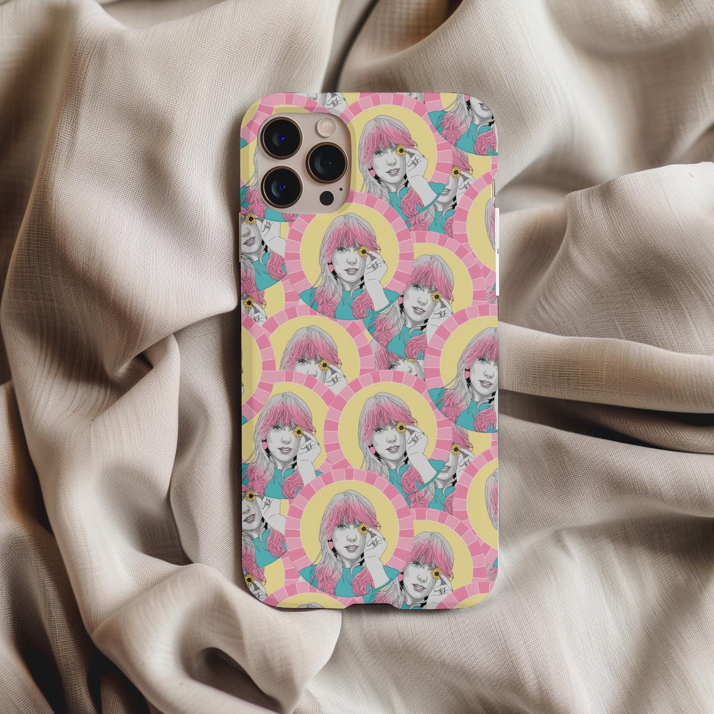 Pop Art Taylor Swift Phone Case featuring colorful repeated portrait design on a stylish phone cover placed on fabric background
