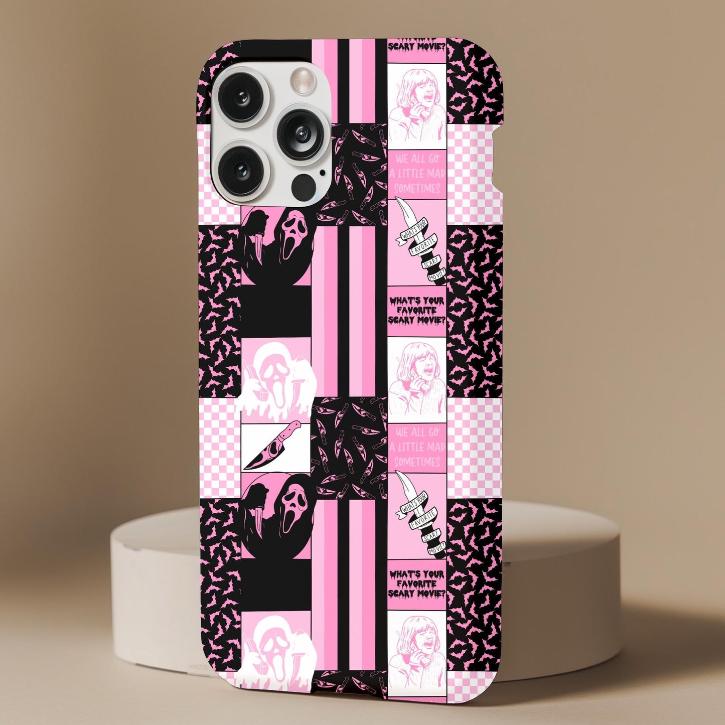 Pink Ghostface Patchwork Phone Case featuring horror-themed pink and black patch design for stylish phone protection