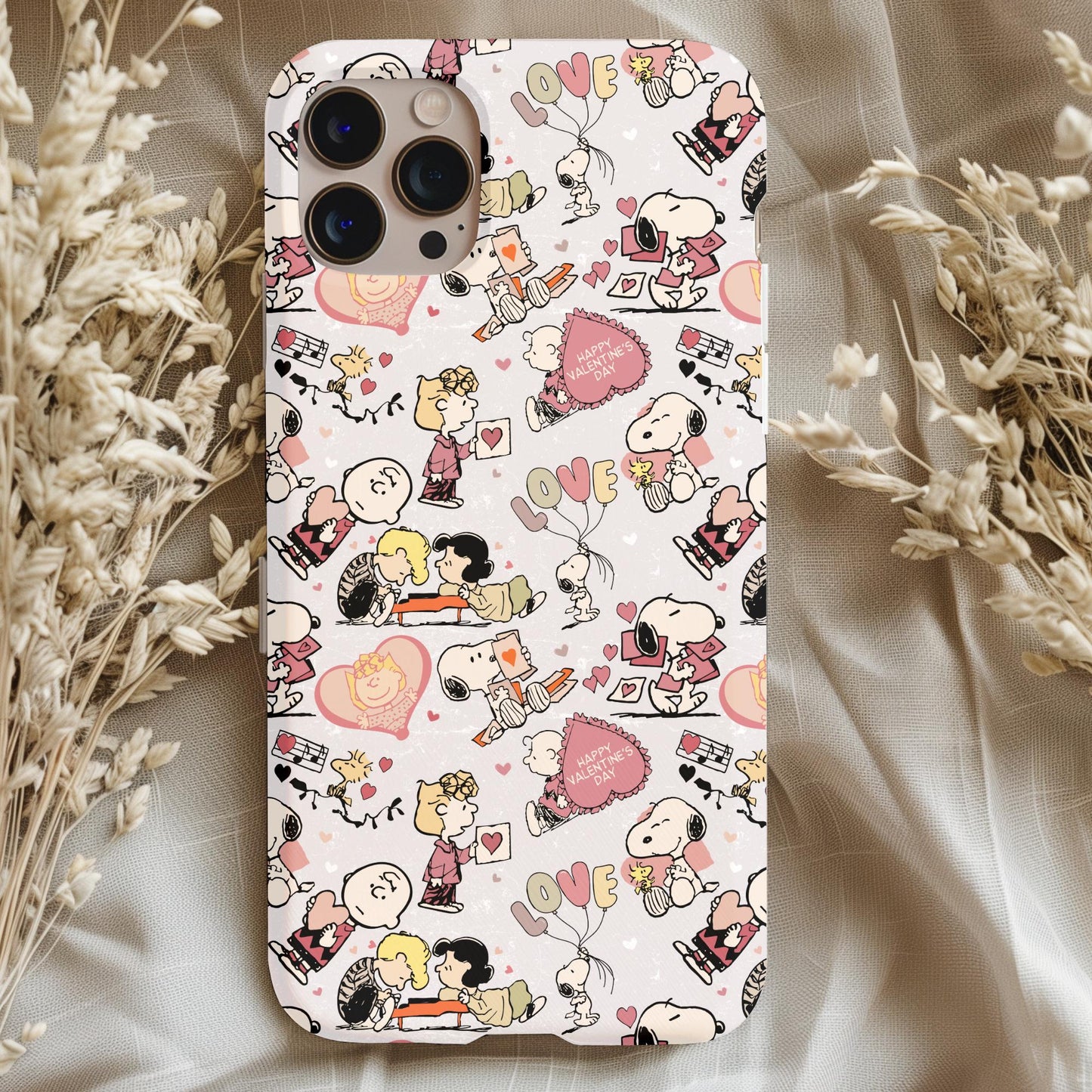 Peanuts Love Phone Case featuring playful romantic Peanuts characters in pastel tones on a soft background