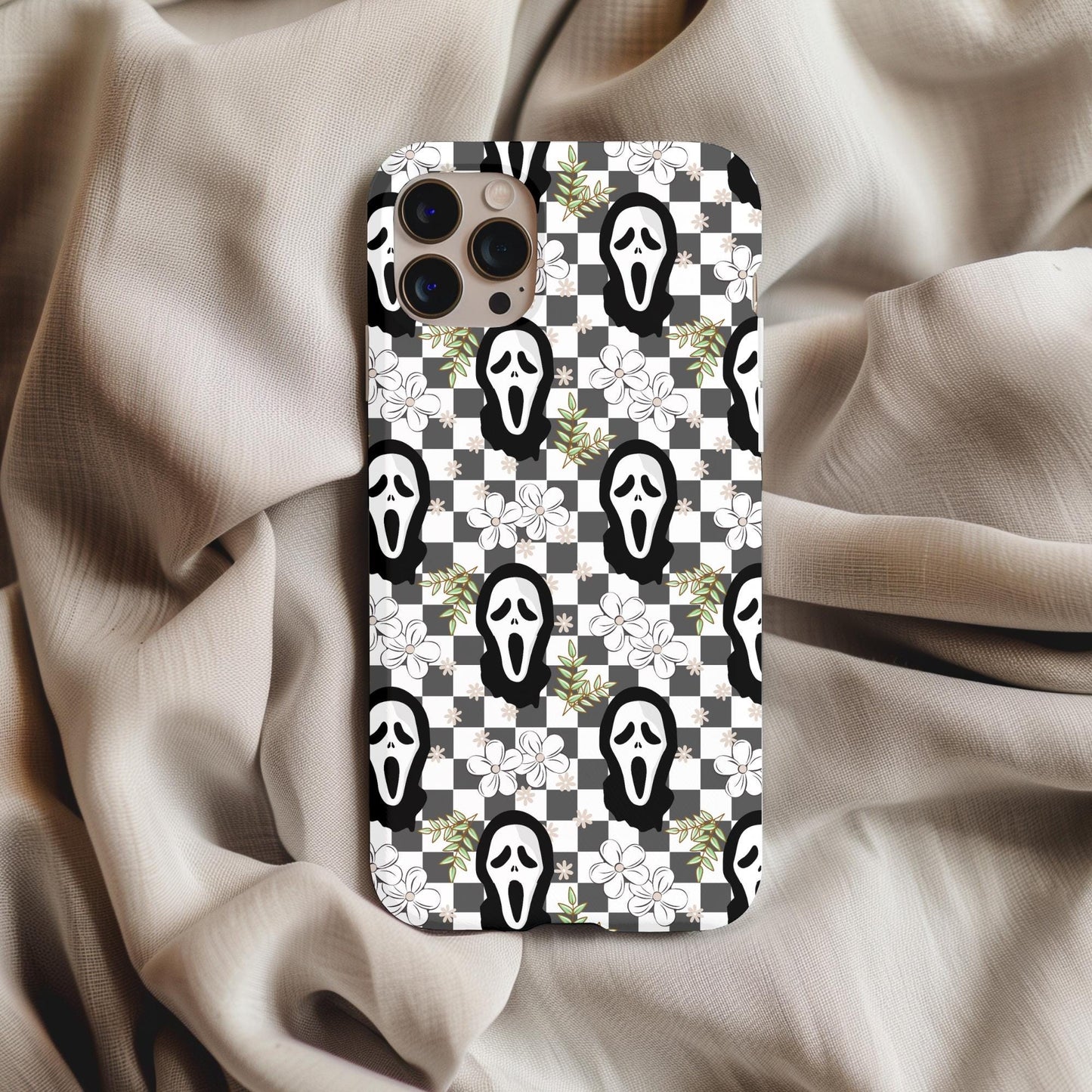 Floral Ghostface Checker Phone Case with black and white checkerboard, ghostface masks, and white floral accents design