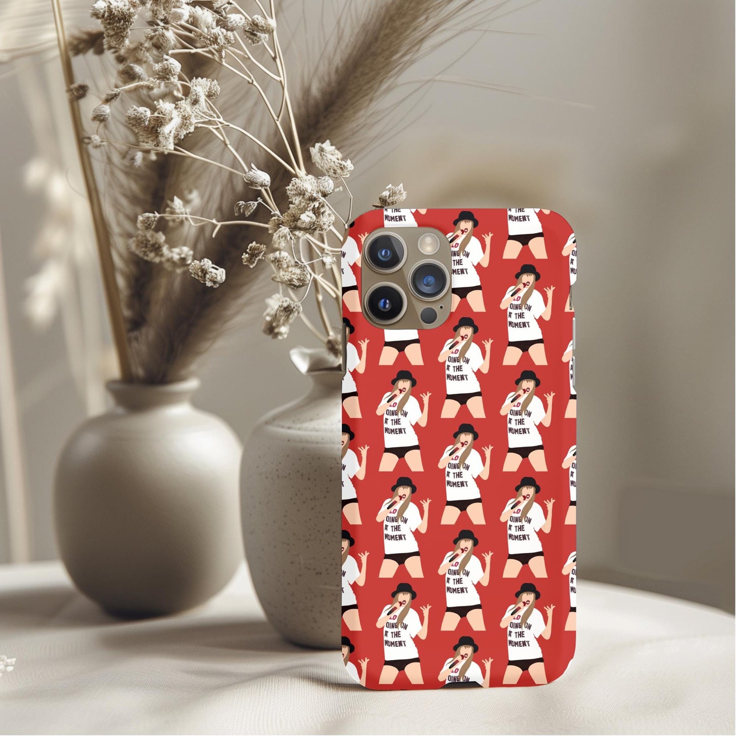 Taylor Swift Alot Going On Red Phone Case featuring repeating illustration of singer in dynamic pose on red background