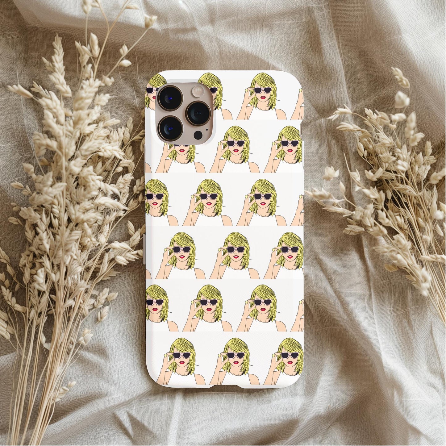 Taylor Swift Sunglasses Phone Case featuring a repeated illustration of a woman with blonde hair and sunglasses on a white background.