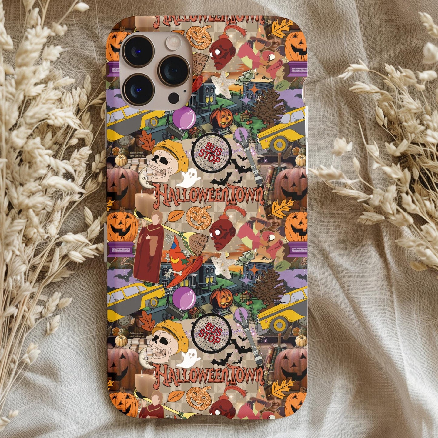 Halloweentown Collage Phone Case featuring spooky pumpkins, skeletons, ghosts, and Halloween bus stop design.