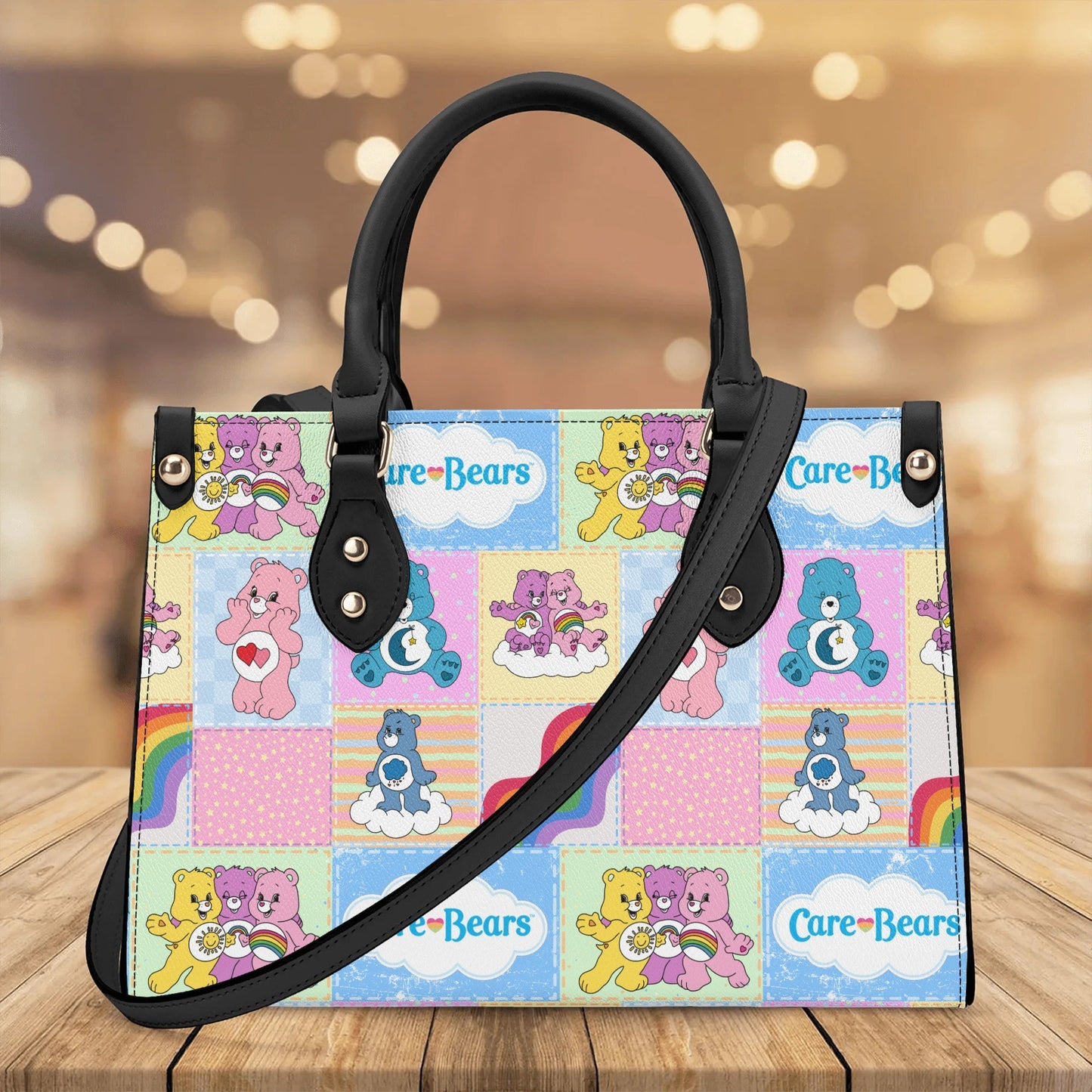 Nostalgic Care Bears Patchwork Leather Handbag with colorful bears and rainbow designs on a checkered background