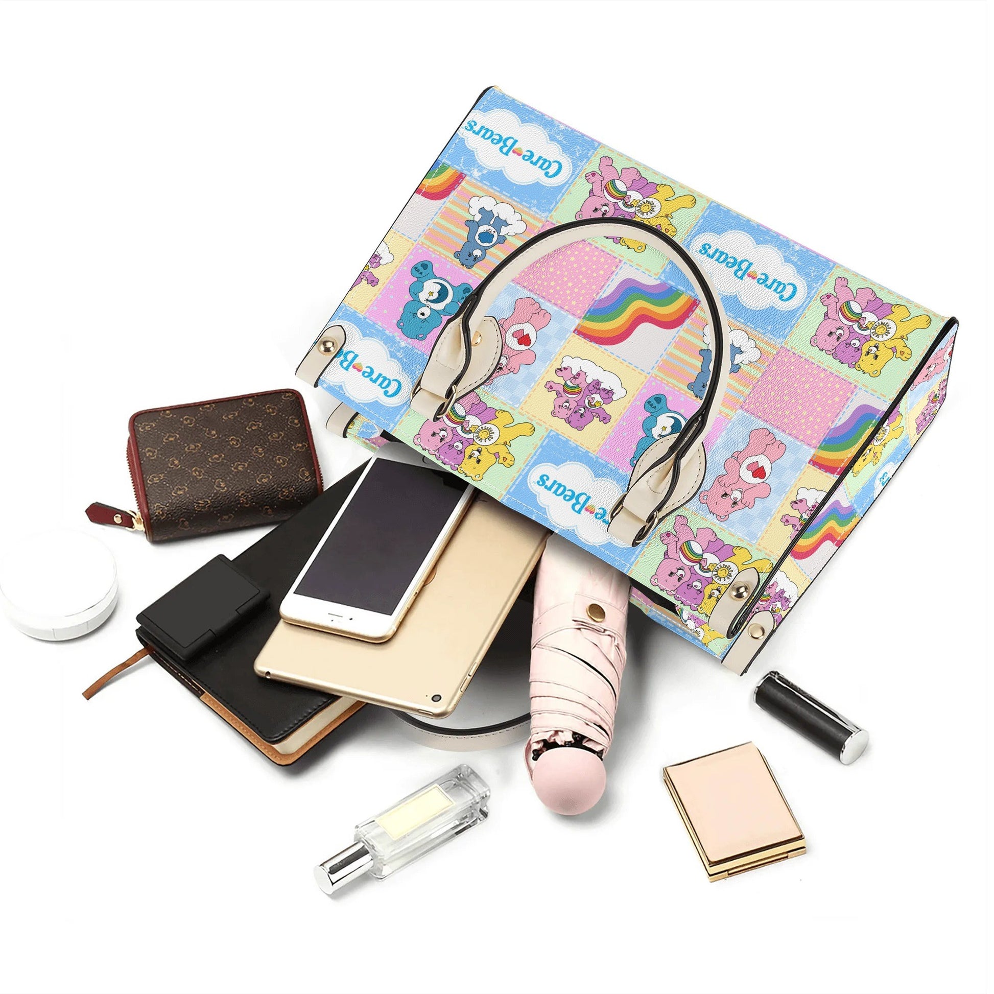 Nostalgic Care Bears Patchwork Leather Handbag with colorful patchwork design and playful Care Bears prints displayed with everyday essentials