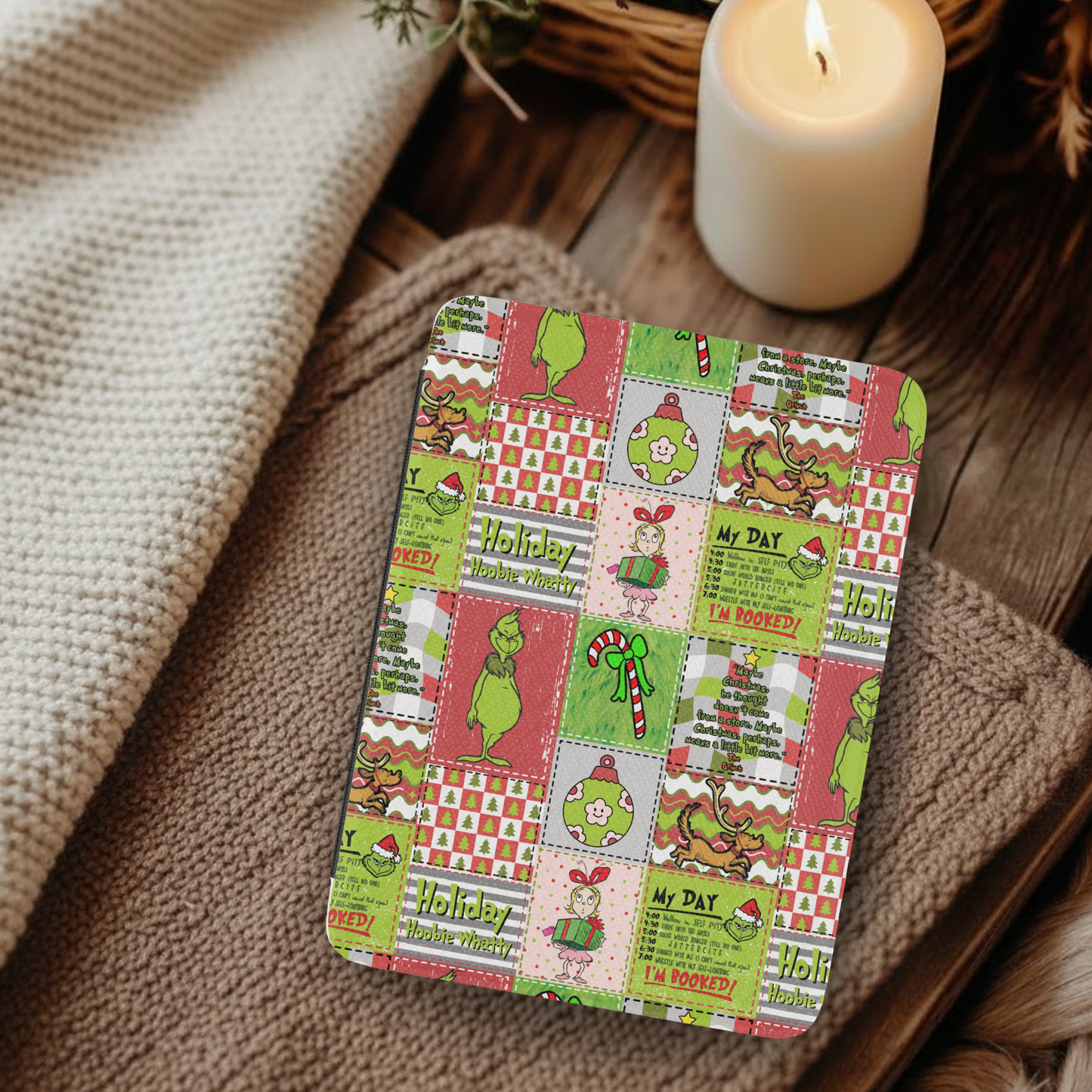 Christmas Grinch Patchwork Leather Kindle Case with Hand Strap featuring holiday-themed colorful Grinch design on cozy fabric background