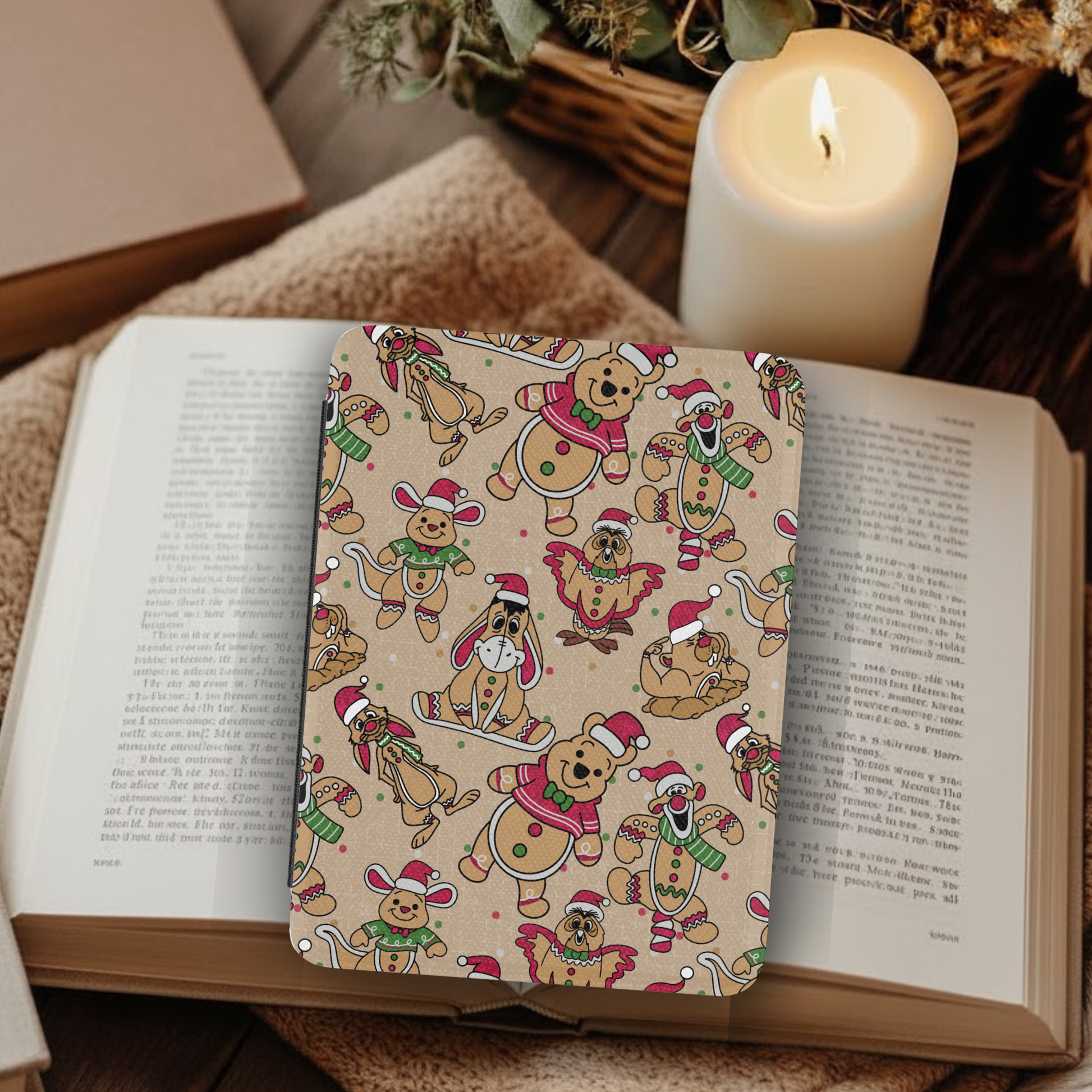 Christmas Winnie the Pooh Bear Leather Kindle Case with Hand Strap featuring festive character pattern on an open book background