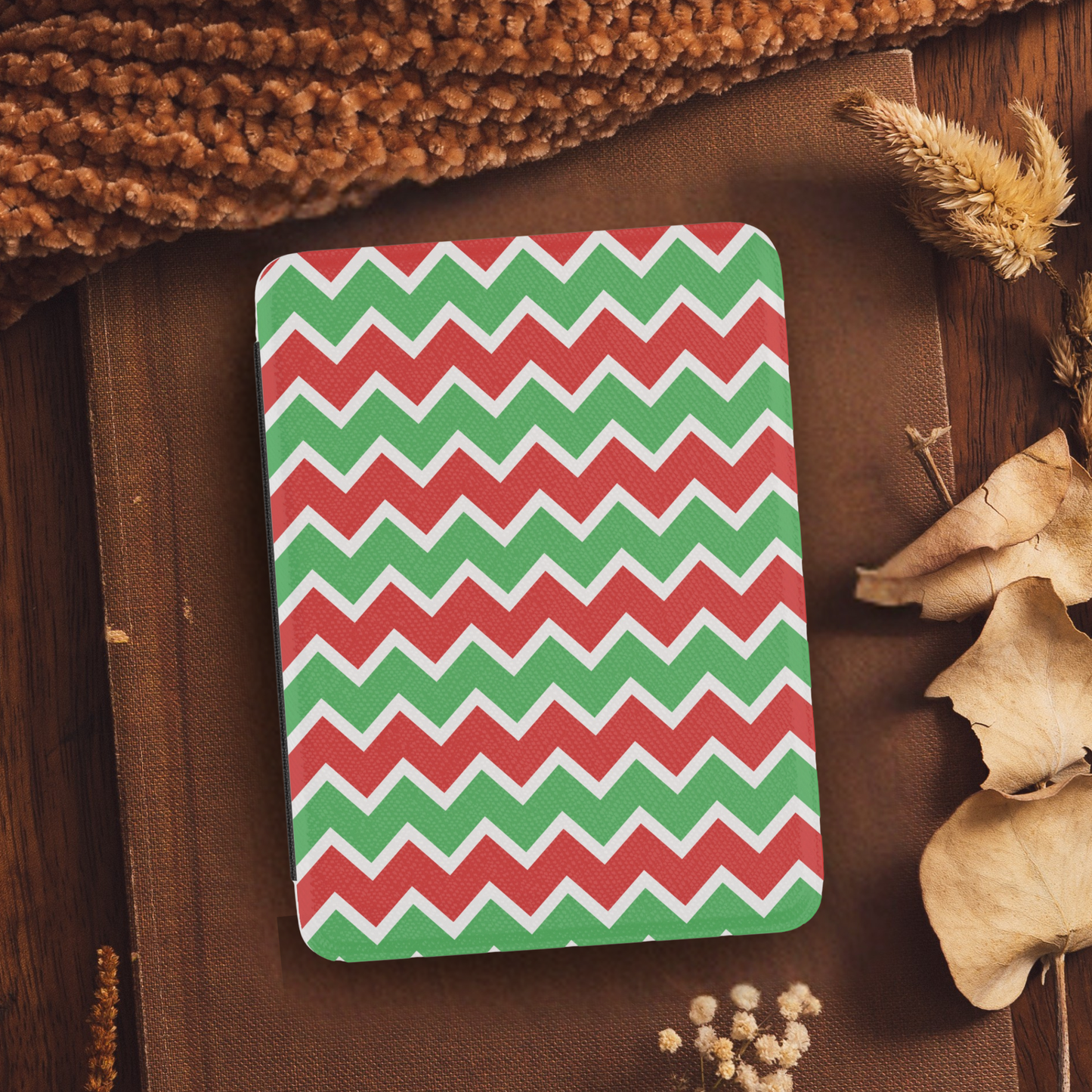 Christmas Chevron Pattern Leather Kindle Case with Hand Strap featuring festive red and green zigzag design on a cozy background