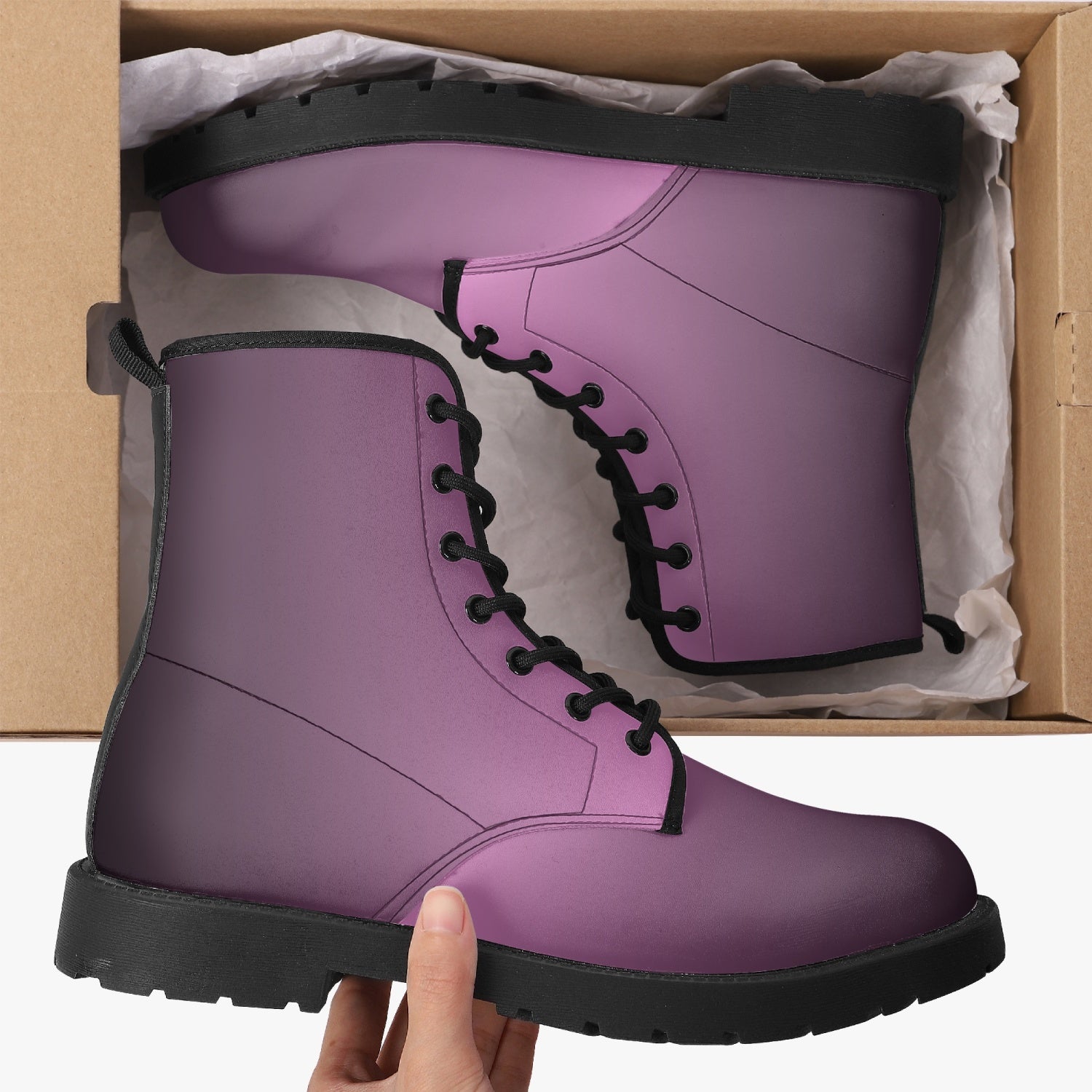 Black Pink Gradient Leather Combat Boots inside box with black soles and laces on white tissue paper background