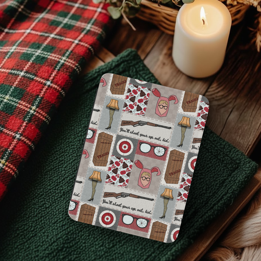 A Christmas Story Patchwork Leather Kindle Case with Hand Strap featuring festive holiday icons on a rustic background