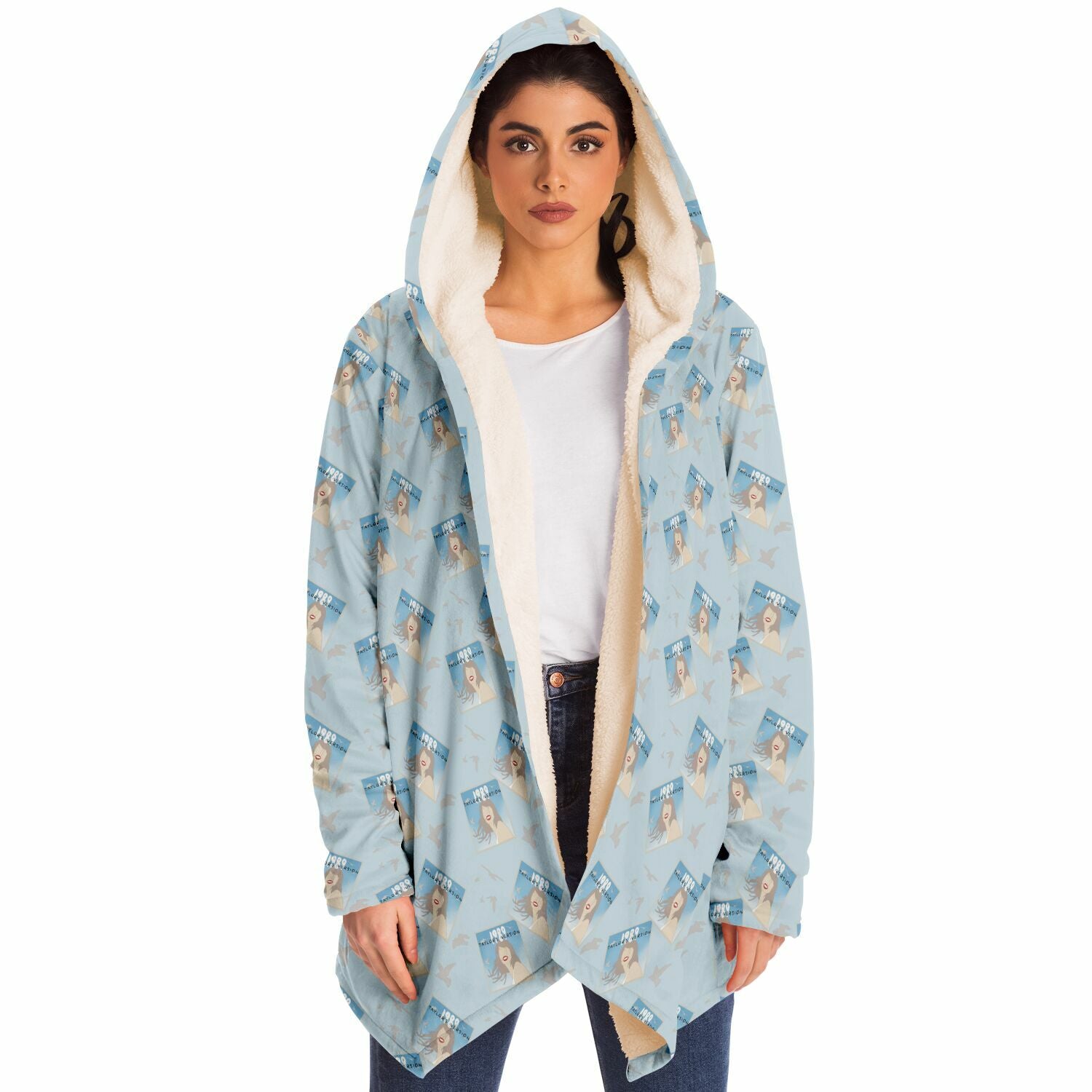 Woman wearing open 1989 Polaroid TSwift fleece lined hooded cloak with printed design and cream interior lining
