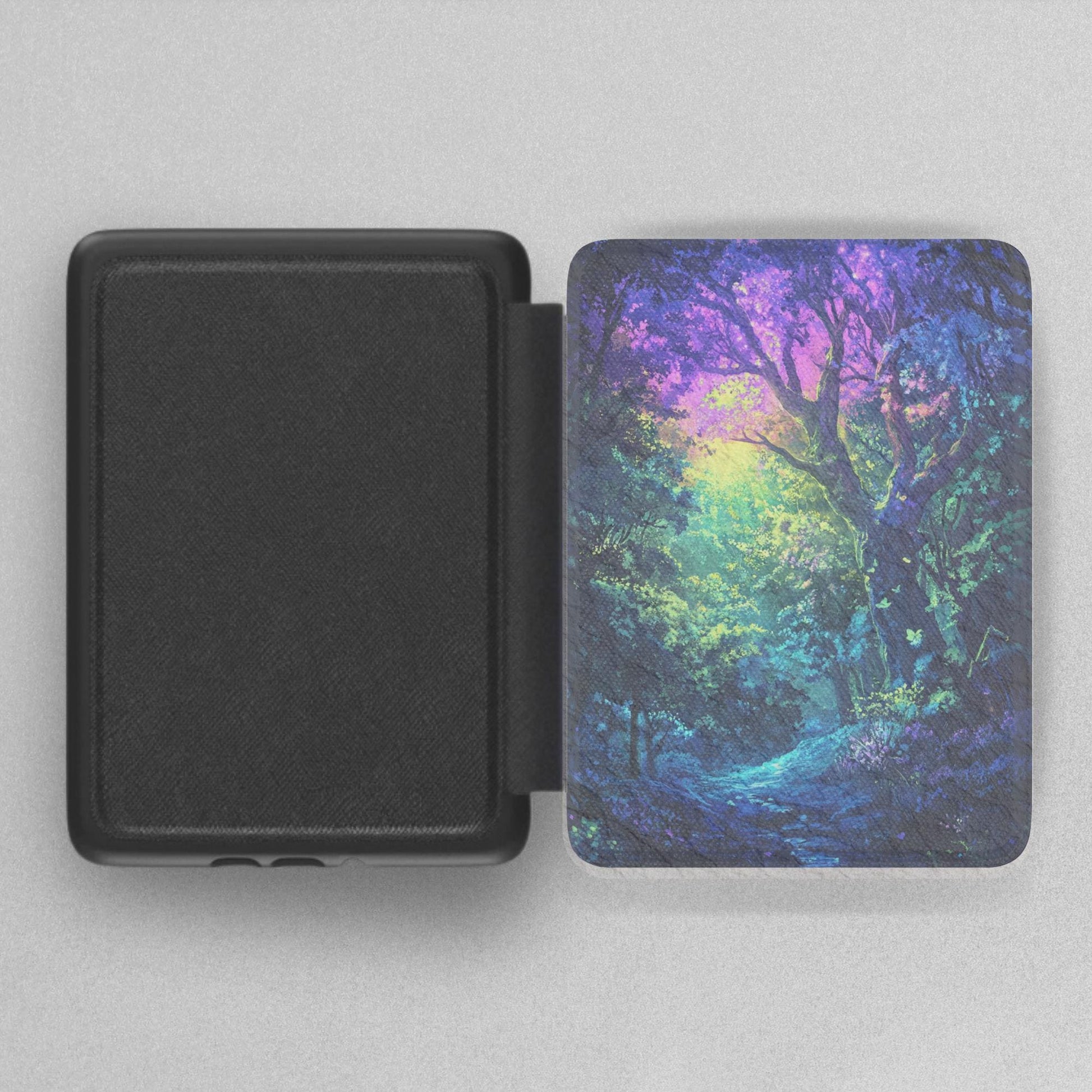 Colorful Magic Forest Leather Kindle Case with Hand Strap featuring vibrant forest art and durable protective design