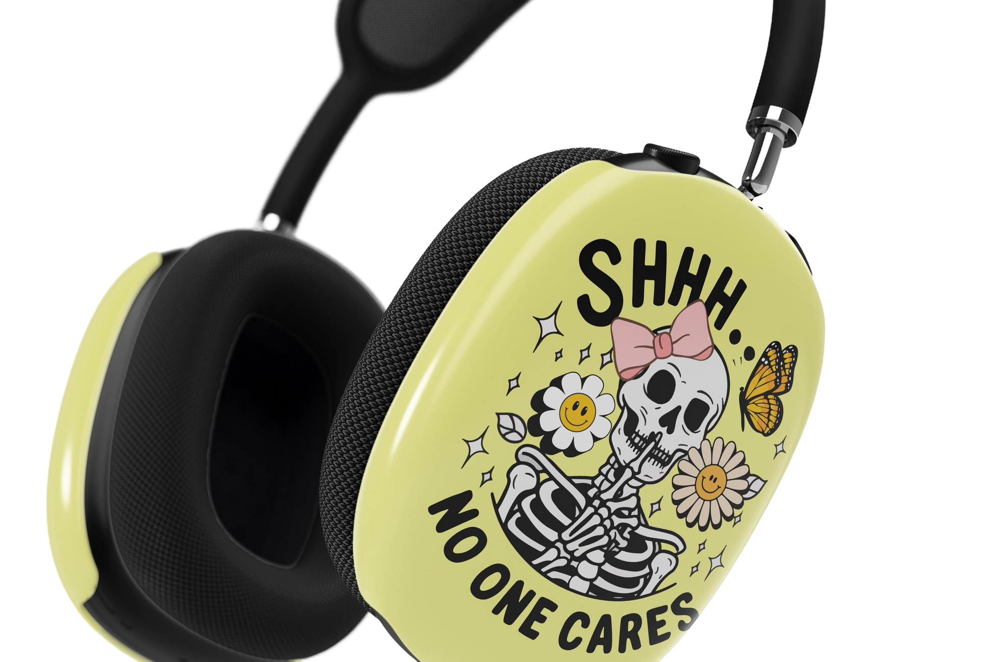 a pair of yellow headphones with a skull on it